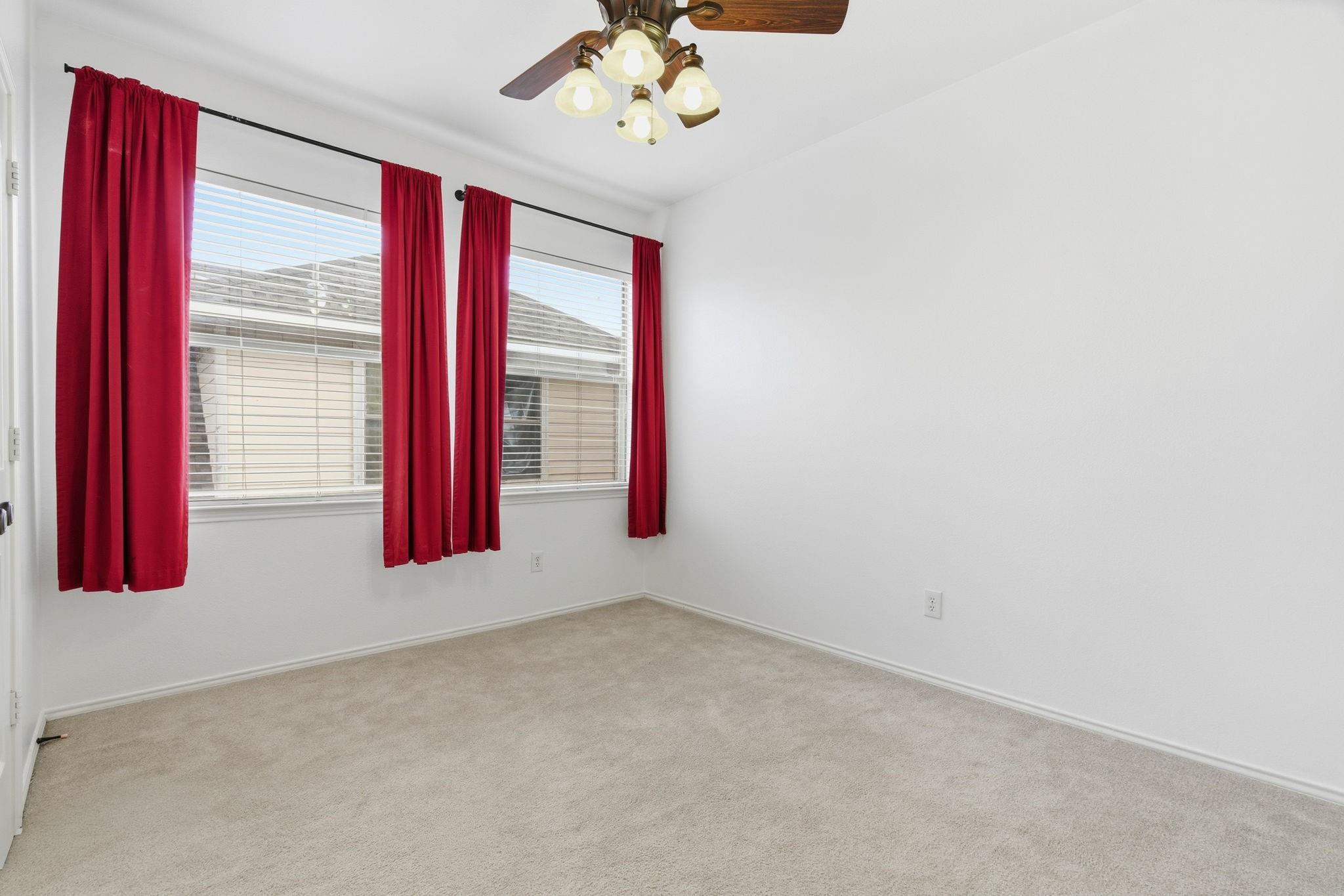Red-Accent Bedroom before virtual staging