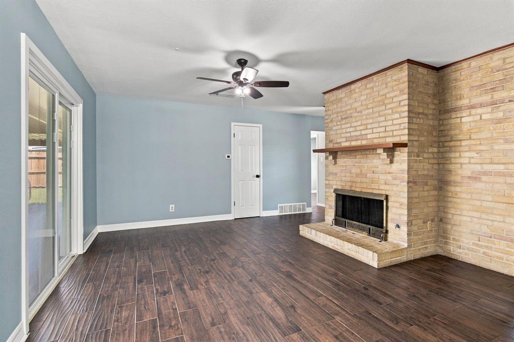 Blue-Wall Brick Fireplace before virtual staging
