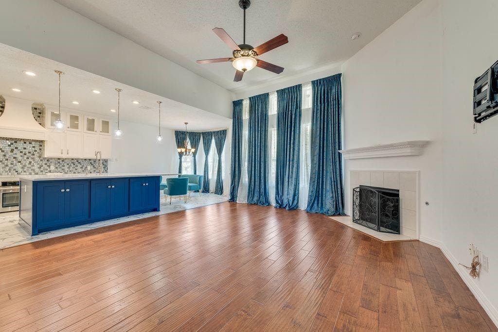 Bold Blue Living & Kitchen before virtual staging